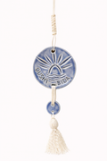 Blue ceramic medallion with tassel