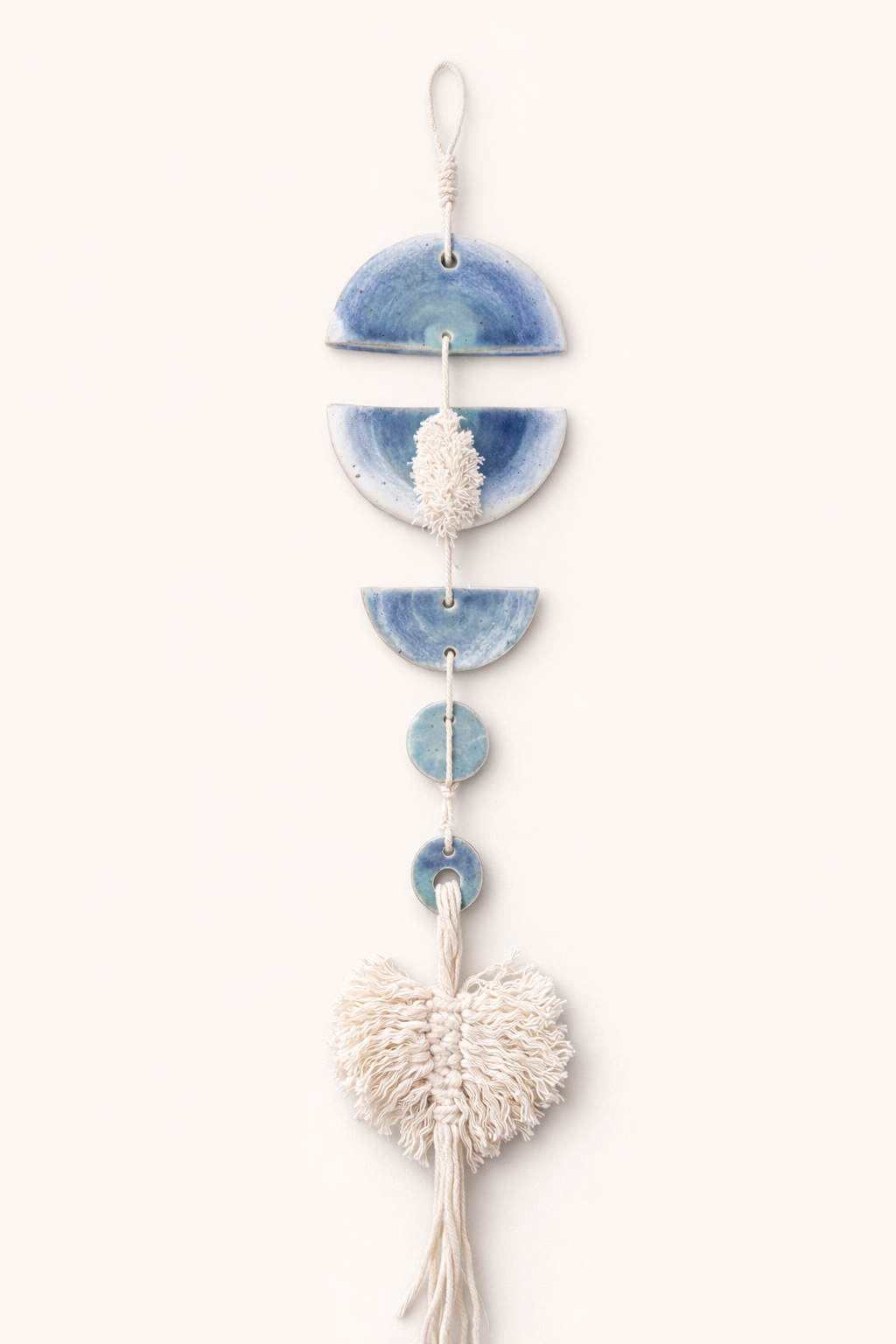 Handcrafted ceramic tassel wall hanging