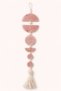 Handcrafted pink ceramic wall hanging
