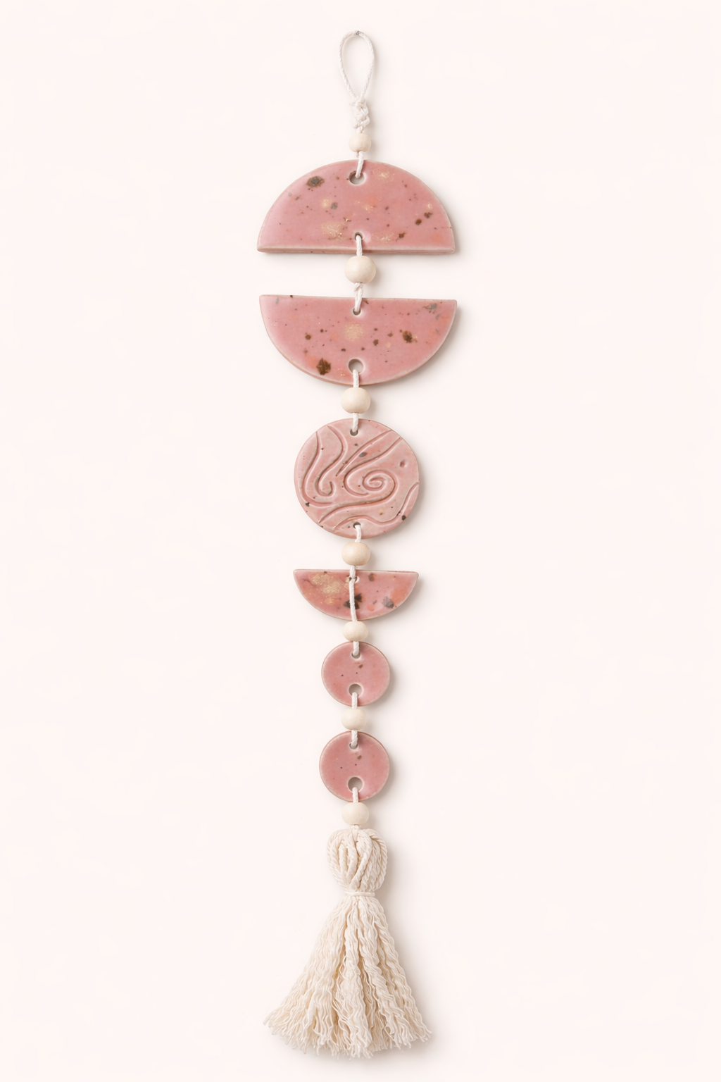 Handcrafted pink ceramic wall hanging