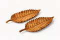 Intricate teak leaf trays