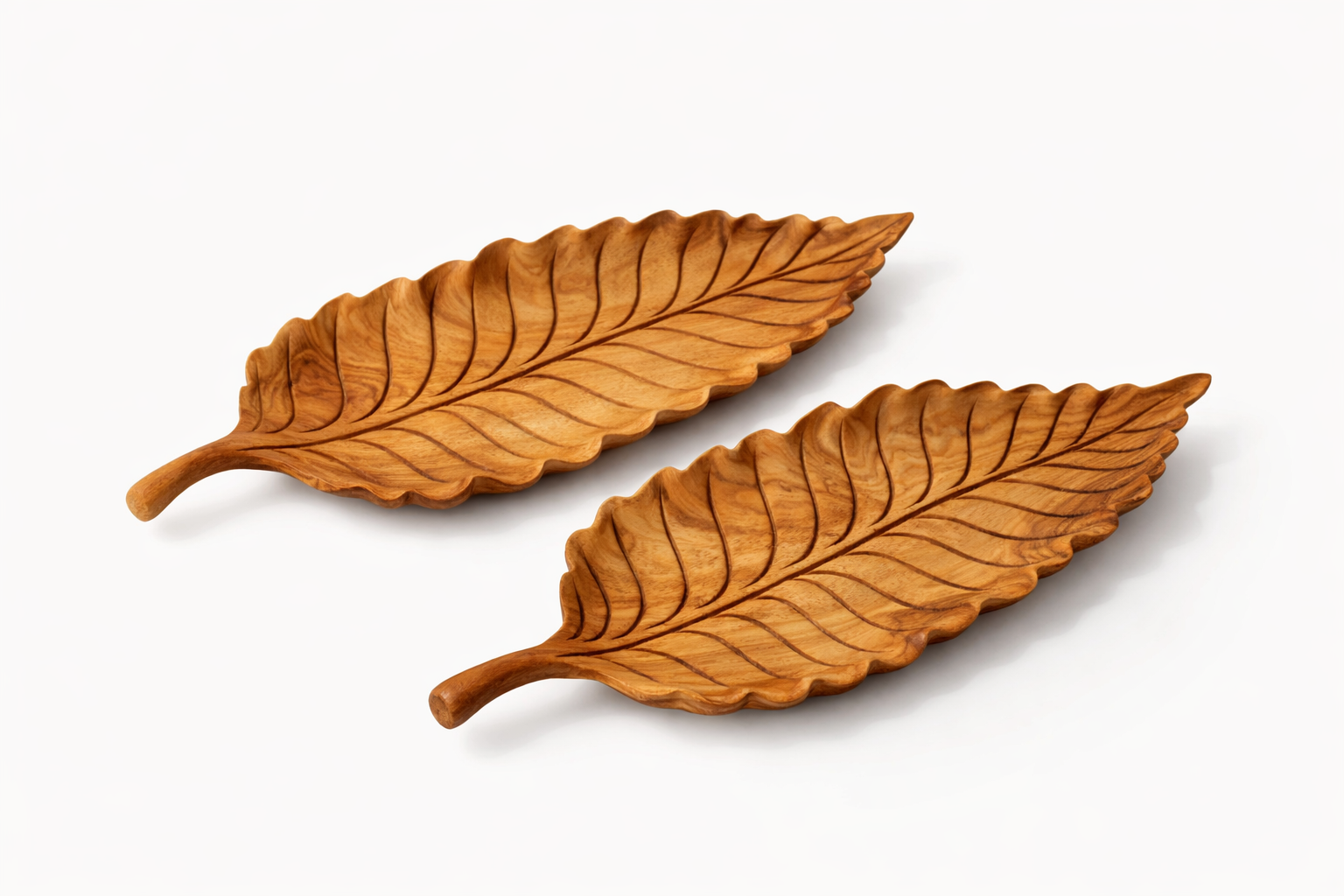 Intricate teak leaf trays